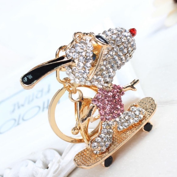 Crystal Snoopy Riding Skateboard Keychain Charm - Picture 2 of 15